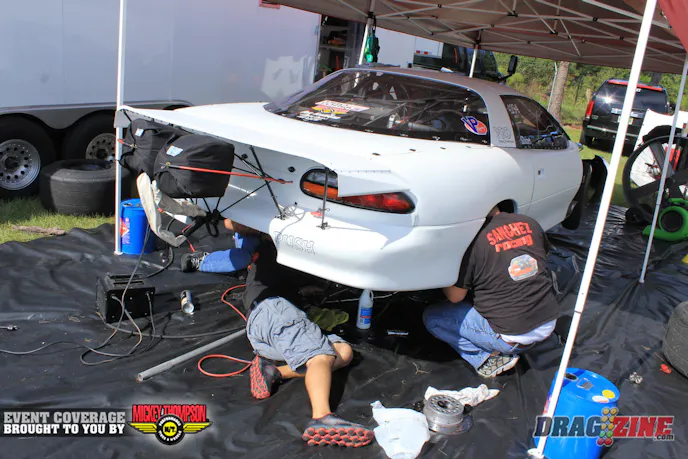 Candido sanchez and crew were making a gear change this morning in the Pro Drag Radial Camaro looking to tame the car down after testing last night.