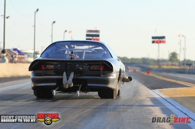 Troy Blake stayed in Pro Mod despite the small tires to get some testing in. He has not had a full hit today, the car made a move right on this run clicking it to a 5.73.
