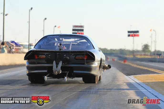 Troy Blake stayed in Pro Mod despite the small tires to get some testing in. He has not had a full hit today, the car made a move right on this run clicking it to a 5.73.