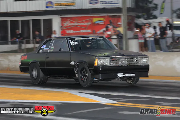 Eric Kenward was struggling this weekend keeping the front down and the rear hooked on his Garrett turbocharged Malibu. He went straight down runnign a 4.87 at 149 taking over fourth in X275.