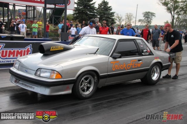 The class for drag radial diehards, Wiseco X275, presented by TRZ Motorsports, had a field of sixteen. In the first round of eliminations, Ohio-resident Trace Meyer ousted Joe Pinsoneault, 4.81 to 5.01 and Ronnie “The Modfather” Diaz drove his Modular-powered Mustang to a 4.93 to defeat Scott Carter, whose Mustang went into a monster-sized wheelstand and damaged the radiator when it slammed down. 