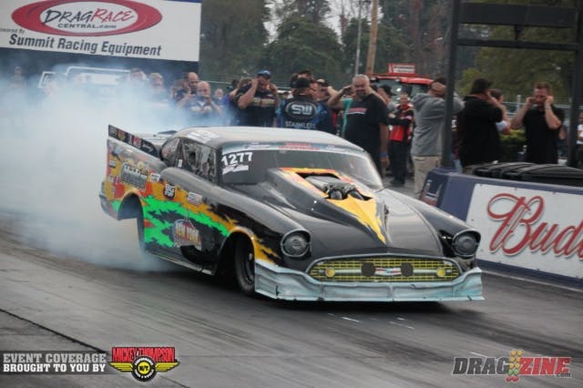 Twenty-eight cars — with drivers from across the United States, Canada and Puerto Rico — filed into the staging lanes for the first round of eliminations in Pro Line Racing Outlaw Pro Mod. Bruce Boland blasted to a 6.08 and the win over Chris Mondor, who was forced to lift. Mike Cusimaro was unable to back up after his burnout, so he climbed out of his car and over the wall to allow Troy Coughlin to make a single, during which there was a sizable explosion under the car as it went through the traps at 6.93. Jose Gonzalez put up a 5.91 for the win over Michael Biehle’s 6.60; Bill Lutz rocketed to a 6.05 and the win over Jeff Roth, who was wheels-up and heading for the wall when he was forced to lift. Eric Latino hung the skinnies, pedaled the car to settle it and collected a 6.53 and the win over Dave Roemer, whose car went into tire shake at the hit. 