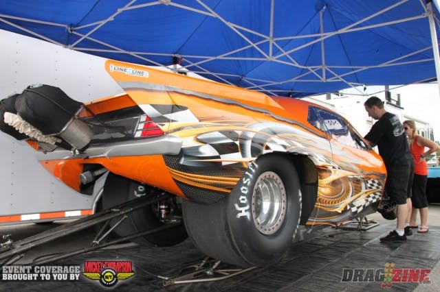 Jason Kalso just arrived and is readying his ’71 ‘Cuda for the first round of Pro Line Racing Outlaw Pro Mod qualifying. At a recent NMCA race, a lifter let go in his 526 cubic-inch BAE engine topped with a Roots supercharger, and wiped out all of the rods and cam, but it’s fixed up and ready to fire.