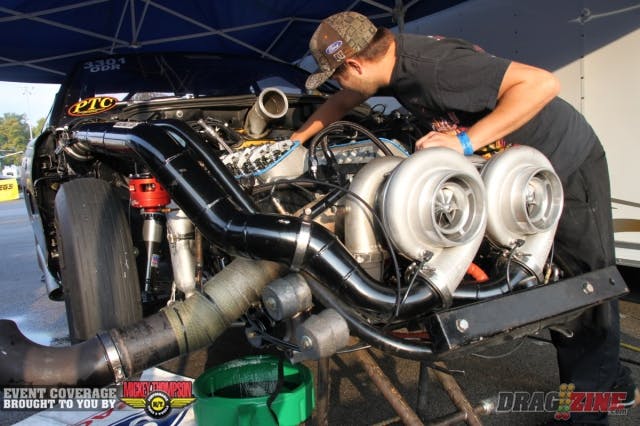 This marks Thomas Jones’ second weekend in his newly-purchased DMC-built ’95 Mustang, powered by a 540 J&E Performance engine and twin 88mm Precision turbos. He popped off a 4.71 at 173 mph in the first round of VP Racing Fuels Outlaw Limited Street/Drag Radial qualifying, but broke a rocker in the process. Still, he landed in the sixth spot going into today’s second round of qualifying and was close to wrapping up repairs this morning.