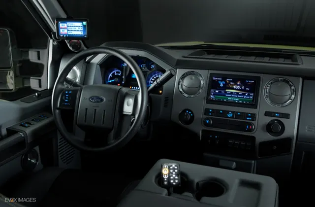 A Kenwood AV system supplies entertainment, navigation and even back-up camera images. The Banks IQ monitor shows powertrain vitals.
