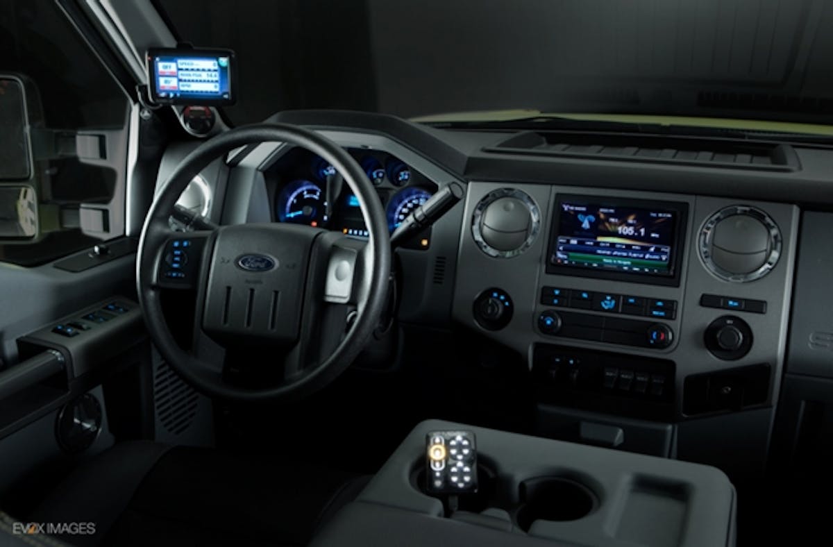 A Kenwood AV system supplies entertainment, navigation and even back-up camera images. The Banks IQ monitor shows powertrain vitals.