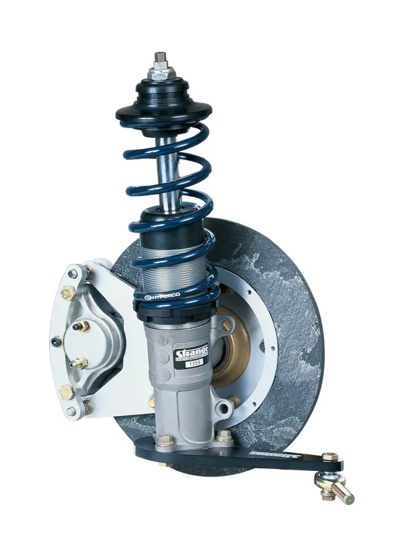 Strange's carbon brake kits (like this one shown with one of their struts) offers a 40% reduction in weight over comparable steel and cast iron brakes. The internals of the calipers are very similar, with a pair of methods for shielding the brake fluid from the intense heat being the primary difference.