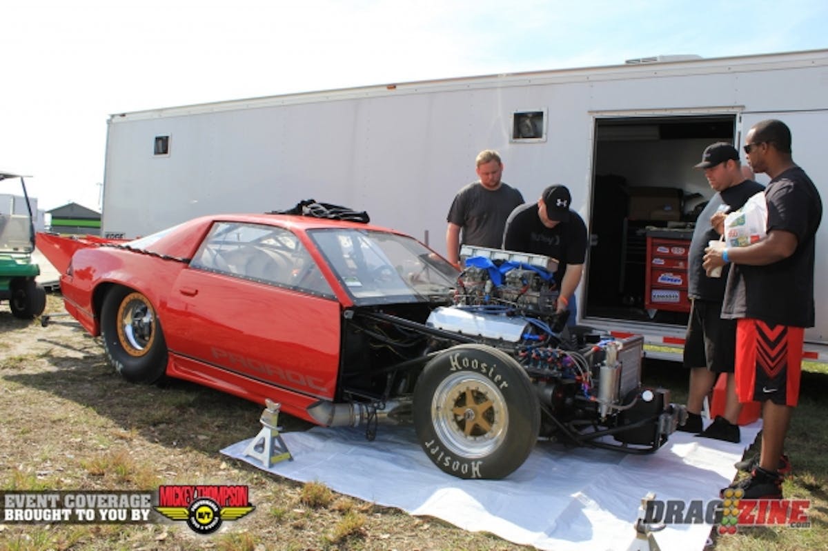 Gene Kerr took his nitrous huffing Prorock Camaro to the Pro Street winner’s circle here in 2010 and is back this weekend to defend that title. He runs a Charlie Buck big block Chevy on nitrous, the crew was prepping the car for today’s qualifying session which starts at 2 PM.