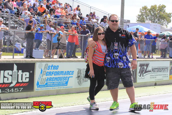 Event announcer Rockin Rob Cherkas brought his daughter Caitlyn along for this weekend all the way from Langhorn, PA. They come down trackside for some photos. Rob has raced at every Street Nationals event but this one and is the only racer to qualify in all four classes,  OL 10.5, Drag Radial, Heavy Street and Pro Street. He is the announcer for the Northeast Outlaw Pro Mods Association. He is currently working with the reality show Hillbilly Armdrop Drags with Kent and Sabrina Rose. The website is www.adrmdropguy.com.