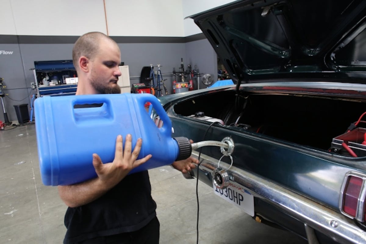 We used VP Racing Fuels' special C16 blend of leaded racing fuel for our on-track debut. This fuel is intended specifically for forced induction and nitrous applications like this.