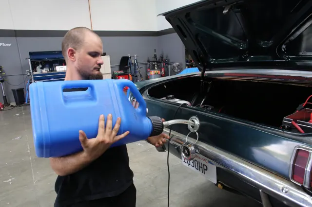 We used VP Racing Fuels' special C16 blend of leaded racing fuel for our on-track debut. This fuel is intended specifically for forced induction and nitrous applications like this.