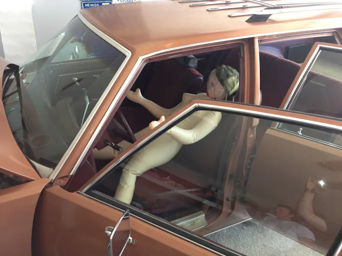 Fortunately (for us), the doll wasn't included with the price of the car.