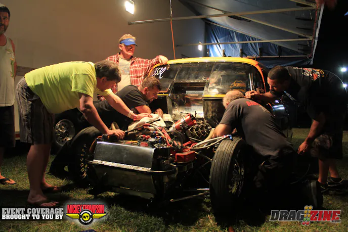 Scott Queesenberry torched a head on number seven cylinder this evening and the damage is severe enough they are done for the weekend. The head is burnt and welded itself to the head stud negating any efforts to remove it in the car.