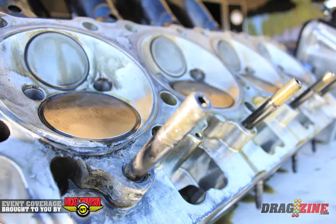 Cherrissa Smallwood burnt a cylinder last night and the team was changing the cylinder heads this morning. The Nitro and Lace.com team is here for some exhibition runs, one of which will be paired with Melissa Hutson. The Car was built by her father Ron Griffis at his shop ICW   Race Cars out of Gainsville, Florida