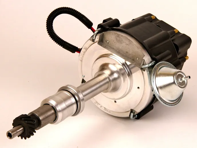 There are a pair of bronze bushings, one at each end of the distributor, to ensure accurate spark triggering. Vacuum advance is also provided for smooth idling properties and good street driving characteristics.