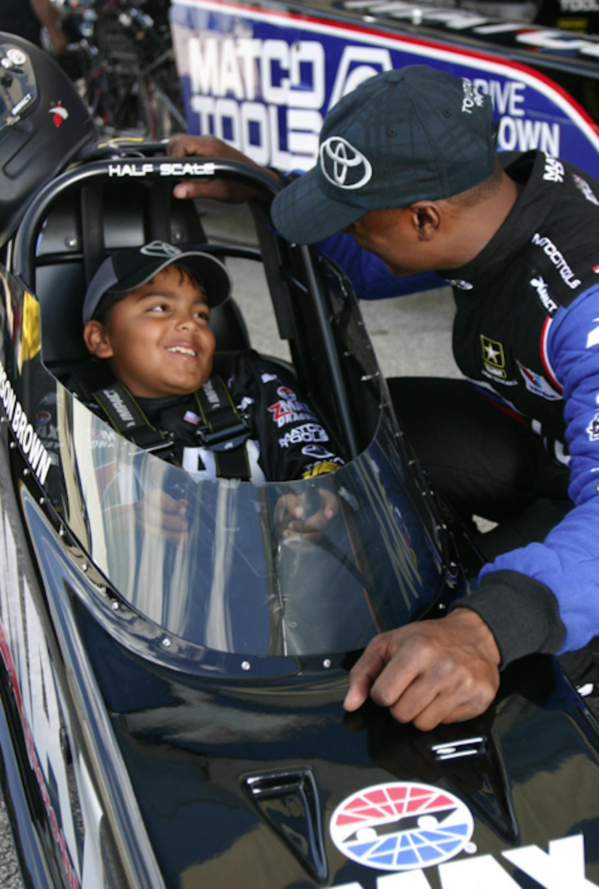 2012 Top Fuel champion Antron Brown, with eldest son, Anson.