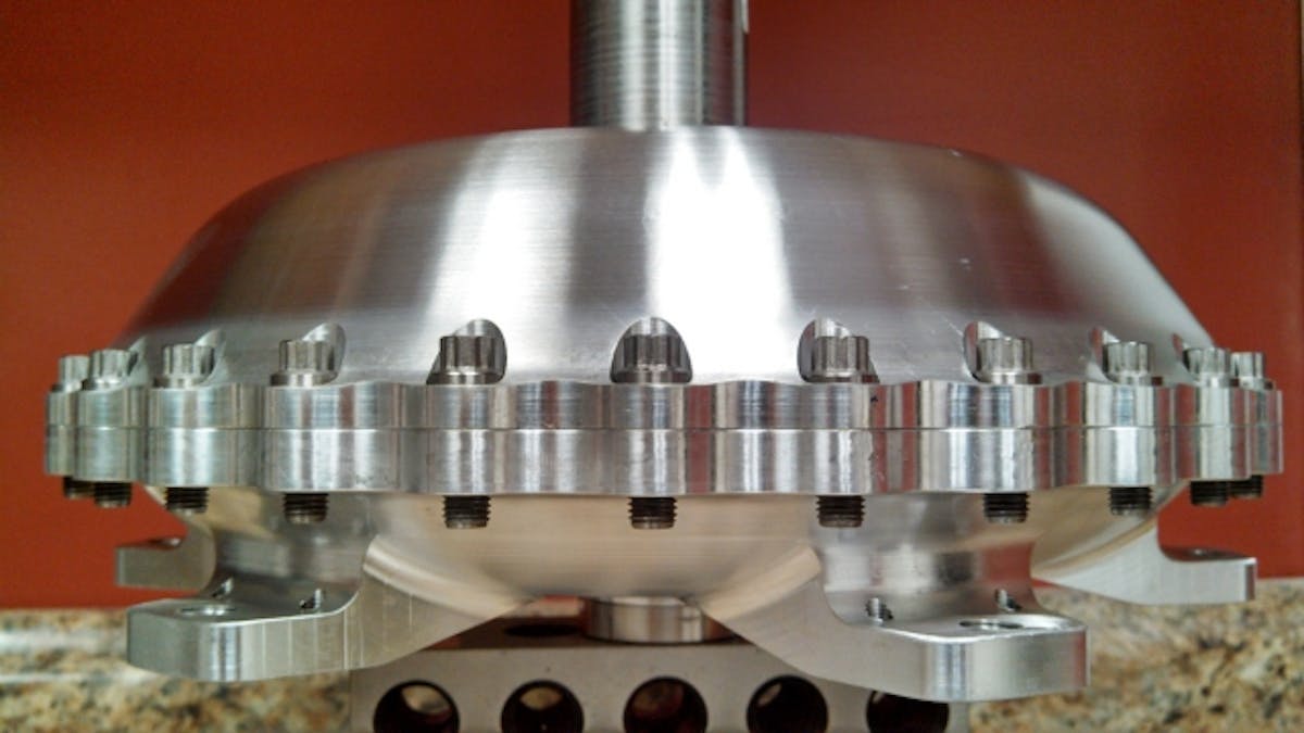 A side view of the NXS torque converter destined for Project Blown Z. Notice the two formulations of alloy top and bottom - these are selected for their individual properties and how they perform in the intense environment a torque converter experiences.