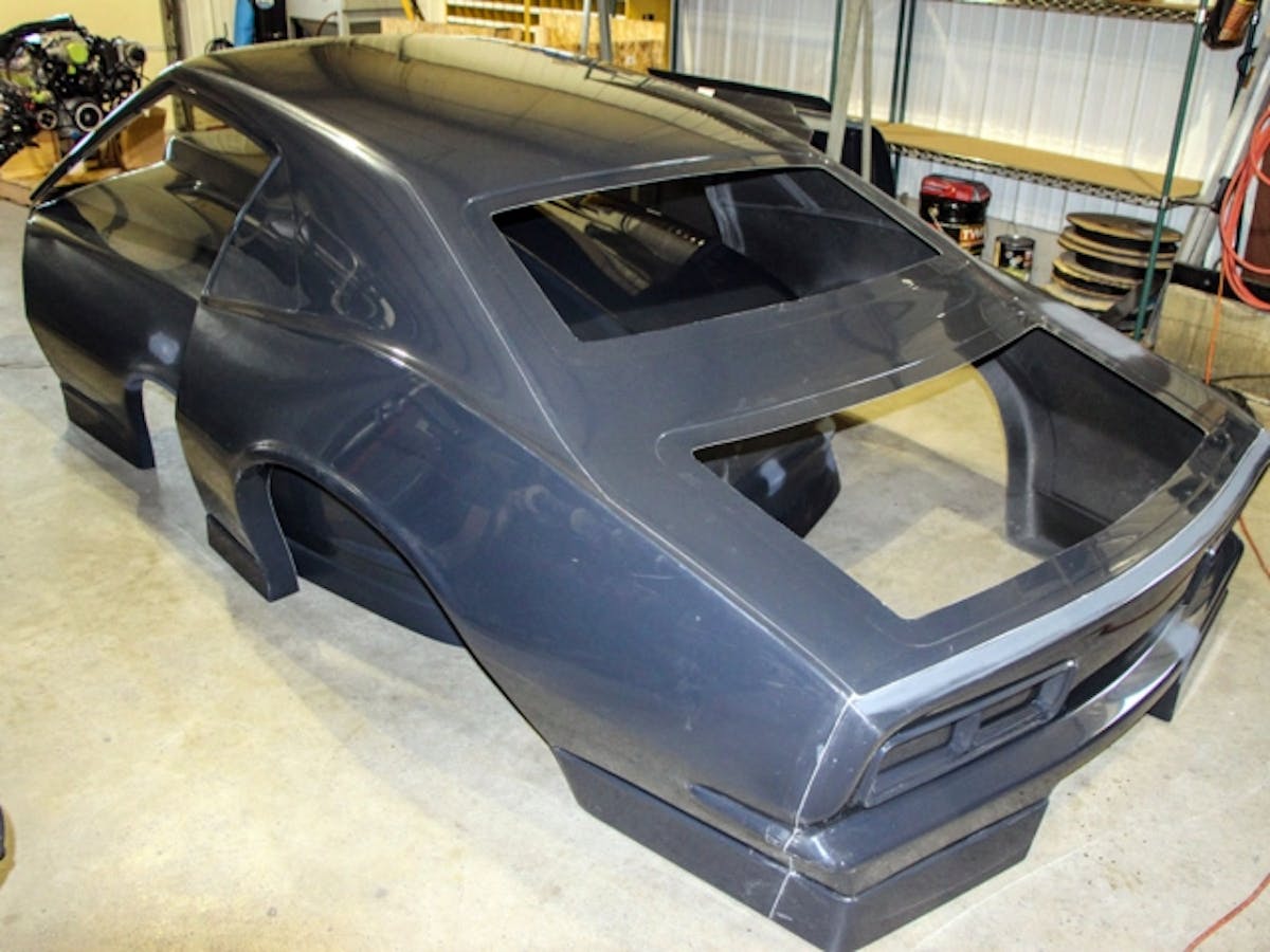 Here's the finished body straight from the mold, after de-molding and trimming. The full body including front end, doors, and wing weighs just 53 pounds.