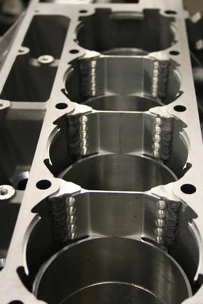 These photos show details of ERL’s Superdeck I truss system, before and after the sleeves are installed. This greatly strengthens the factory LS block to the point where they have one customer making a reliable 2,600hp with it.