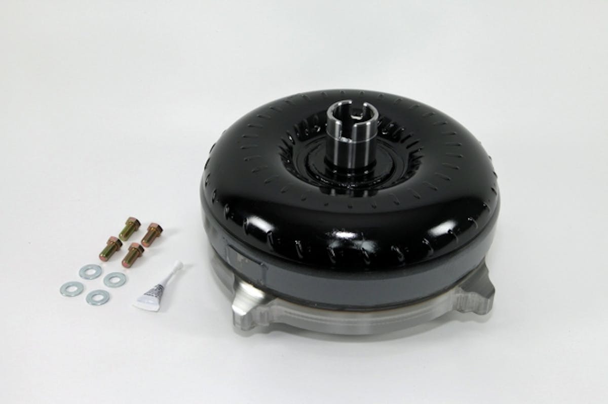 Our 258mm billet-cover triple-disc lockup torque converter from Circle D Specialties showed up with everythig needed to put it in - except the tools, lift, transmission fluid, and mechanic.