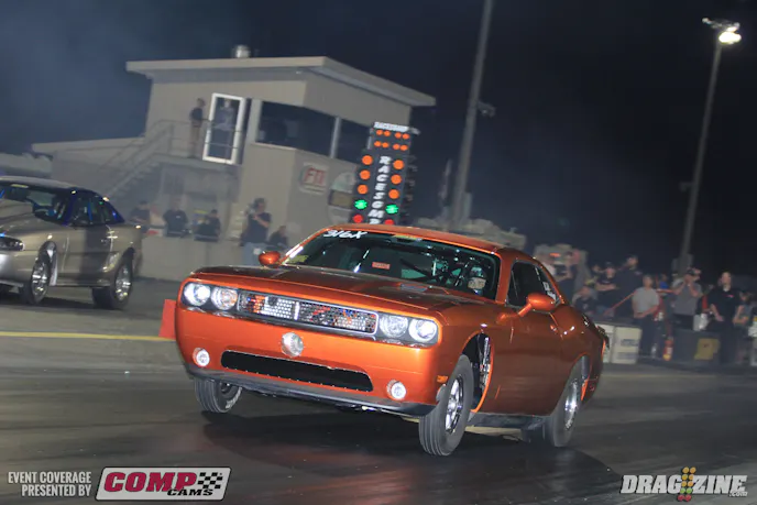 Marty Pearcy own this stunning 2010 Dodge Challanger based out of San Angelo, Texas built by B&B Race Cars. He runs an unusual combination of an Australian Pro Stock Hemi. Mary has the only two aluminum blocks Chrysler made for these heads. Since Mopars are different anyway he swapped from his W8 combo as he didn't feel it would have anought to compete with cars running 4.60's. Originally designed around an F1X Procharger then converter to a turbo after the F1X was disallowed for his combo an