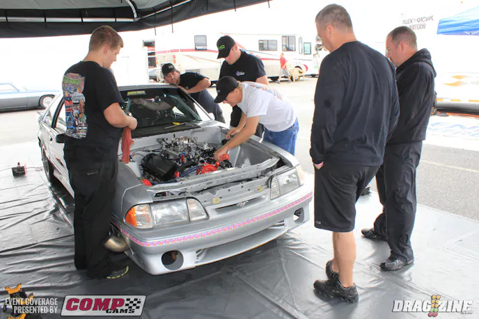 Teem Deez in the house from Texas with Todd Moyer and Chase Driscoll. The crew was going over Driscoll’s car earlier and found a broken rocker. He is running X275 this weekend with a 582 from NRC with Holley Dominator fuel injection and Induction Solutions nitrous backed by a trans from M&M and NCRC converter.