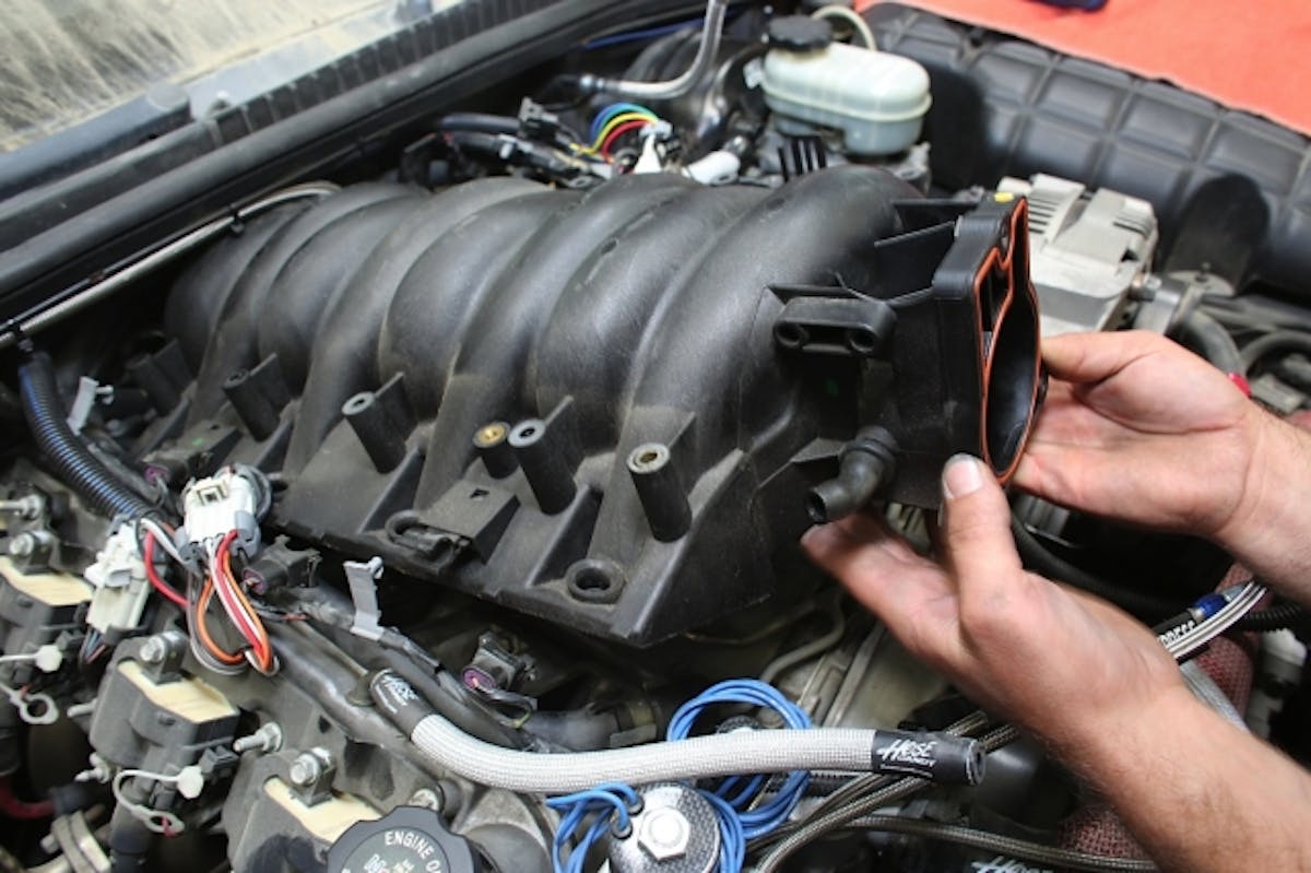 The LS6 manifold was next to come off. While we had the intake off, we took the opportunity to replace the malfunctioning oil pressure sender. If you have a C5 Corvette, you will eventually have it go out on you, too...