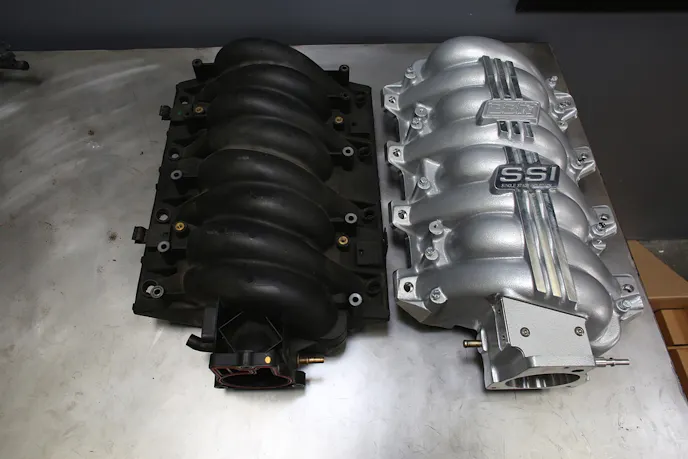 The most obvious difference between a factory LS intake and BBK's SSI is materials - instead of composite, the SSI is made from cast aluminum.