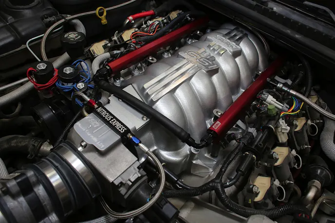 The finished result. The SSI manifold will work with the factory fuel rail and its mid-manifold crossover. Unfortunately, the factory coil covers can't be mounted on the new fuel rails, but we'd rather show them off anyway...