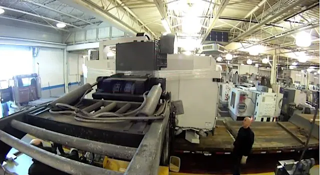 Lifting the Haas VM6 off the trailer