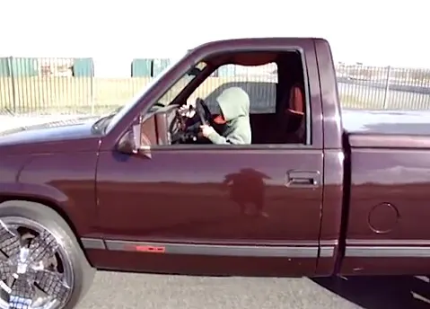 Scooting all the way up to barely reach the pedals!