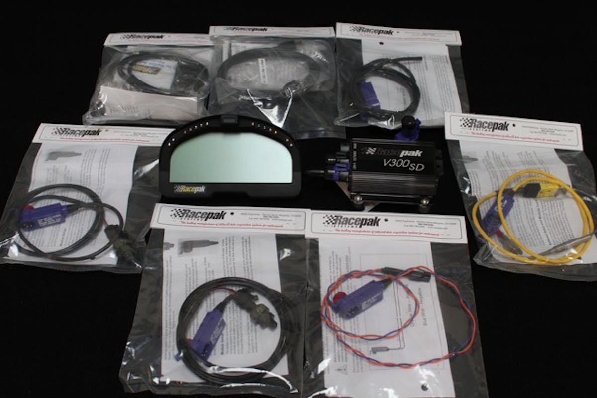 A fully-optioned Racepak system including V300SD logger, IQ3 display dash, and an assortment of Racepak's V-Net sensors.