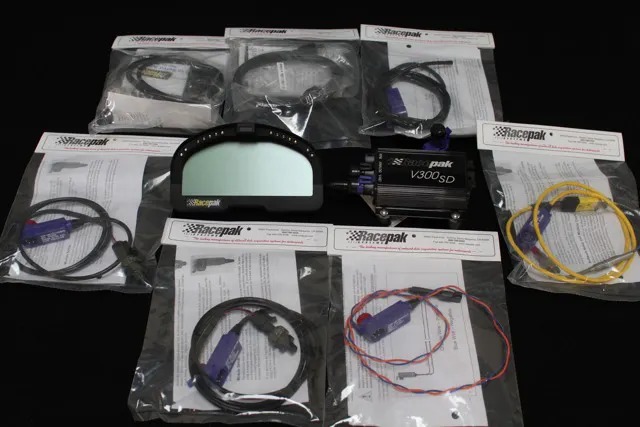 A fully-optioned Racepak system including V300SD logger, IQ3 display dash, and an assortment of Racepak's V-Net sensors.