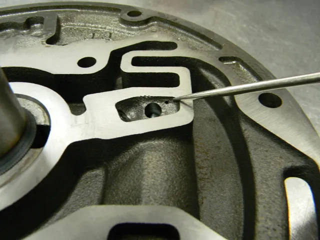 Here's a close-up look at the torque converter's feed balance circuit, which Hughes has added to their Turbo 400's to create a balance in the converter fluid feed circuit.