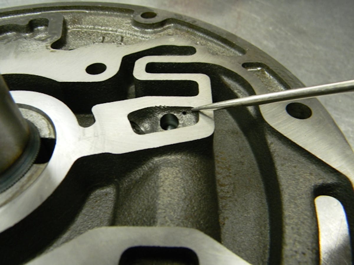 Here's a close-up look at the torque converter's feed balance circuit, which Hughes has added to their Turbo 400's to create a balance in the converter fluid feed circuit.