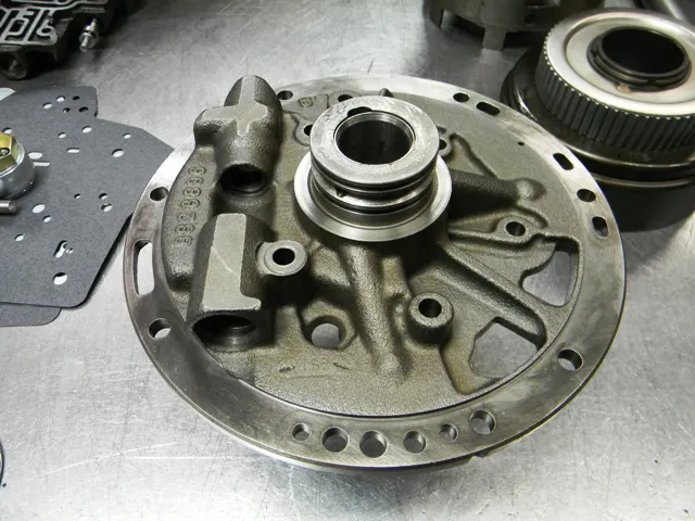 Here’s a rear view of the pump stator. The back of the pump houses the pressure regulator assembly and provides a fluid feed to the forerd drum for application of the forward clutch pack.