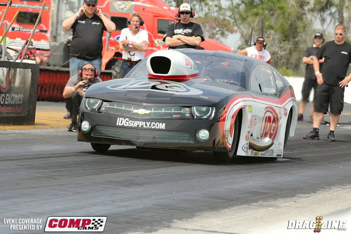 “Tricky” Ricky Smith is here doing laps and running well today. An early hit was a very nice 3.88 at just 198 making the team very happy early in the day. He was in Qatar racing the ADRL this winter and learned some things there which are starting to show up here this week. Later in the session he laid down a stellar 5.84 at 247 MPH. IDG is on board again for the 2014 season and Smith is scheduled to run the full ten race NHRA Pro Mod season to defend his 2013 championship and may hit some other races as schedule permits. Crew this weekend is Brandon who helps Ricky’s son Matt most of the time and Chad.