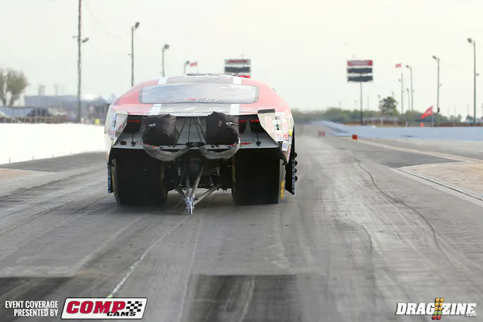 Mike Janis put down a 5.91 on his first run of the day clicking it a little early. He is running a new combo for this year with a new block, heads, manifold and blower. The Jan Cen team is excited about their performance so far and have a better engine in the trailer that will see duty on Tuesday. The New York based team is scheduled for the NHRA Pro Mod circuit this year and have no place for other races at this time. He made three runs today, the second of which drove out of the groove and shut off with the last one being a 5.89, shutting off at 5.4 in the run. Janis said it should have been an .85 or so out the back.