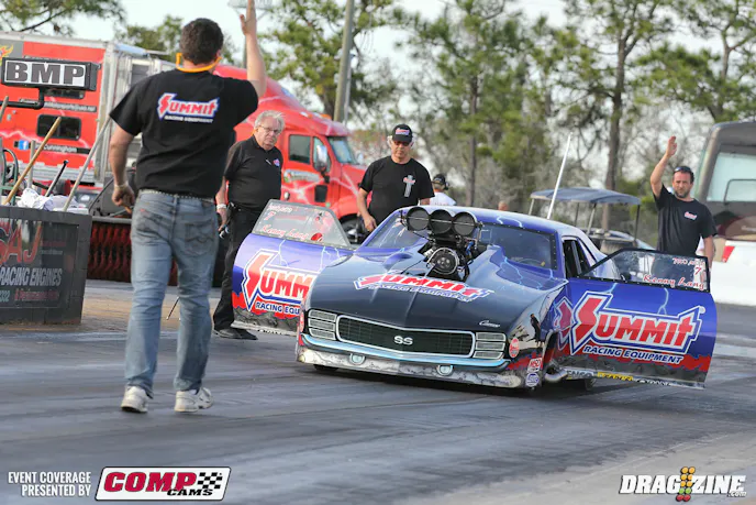 Kenny Lang built, owns and drives the Summit Racing Pro Modified Camaro from a Tim McCamis Chassis. They switched to a Lenco Drive for this year  and use an Al Billes engine. While here I spoke with NHRA Pro Mod Association President John Waldie about what’s new for 2014. The Pro Mod series has garnered several presenting sponsors for this season with J&A Services, OFFWIRE, JEGS Performance Auto Parts, Precision Turbo & Engine, Aeromotive and the recent addition of Powerocks to the growing list of sponsors. The Summit team is happy with their performance so far during testing and looks to be in great shape for this weekend’s event.
