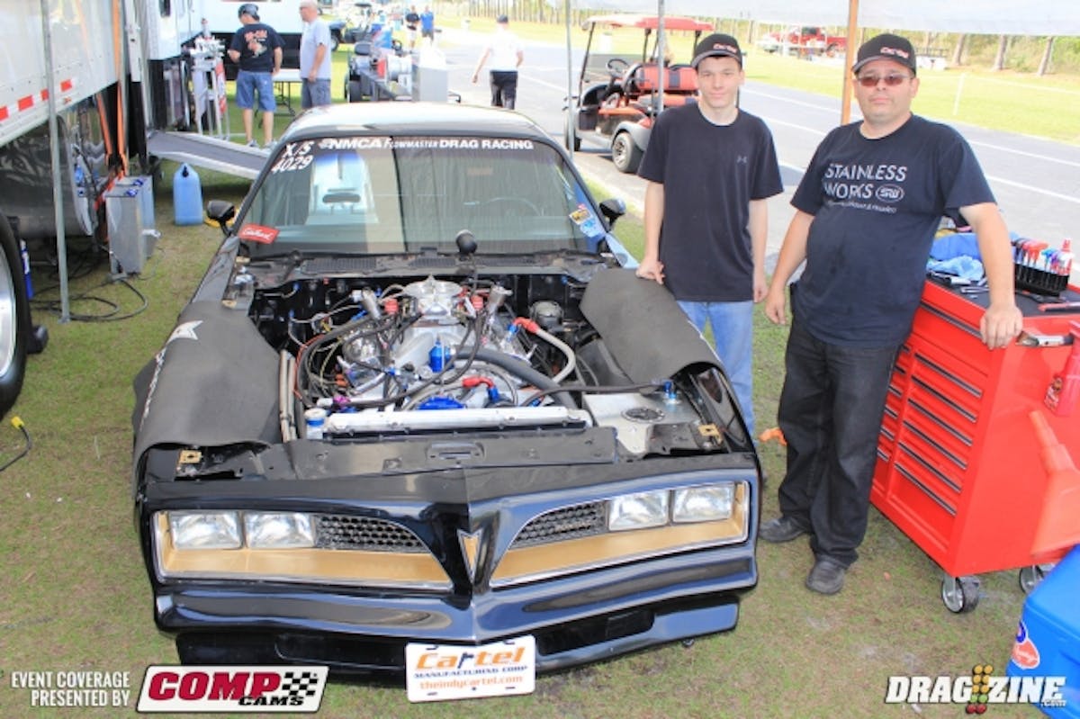 Edelbrock Extreme Street racer Ray Cox is down in Florida for the NMCA season opener with some new things going on for 2014.  Cox has new headers from Stainless Works and bead lock wheels from Cartel and will be running new heads later in the year along with a new intake manifold. The nitrous is set up by Kevin Neal with engine assembly done in house by Ray. Sponsors include Cartel, Aerospace Components, Race Engineering, Moser and a Mark Micke transmission. Ray’s son Brad and Ray Cox from left to right. This will be there first hits this year this weekend.