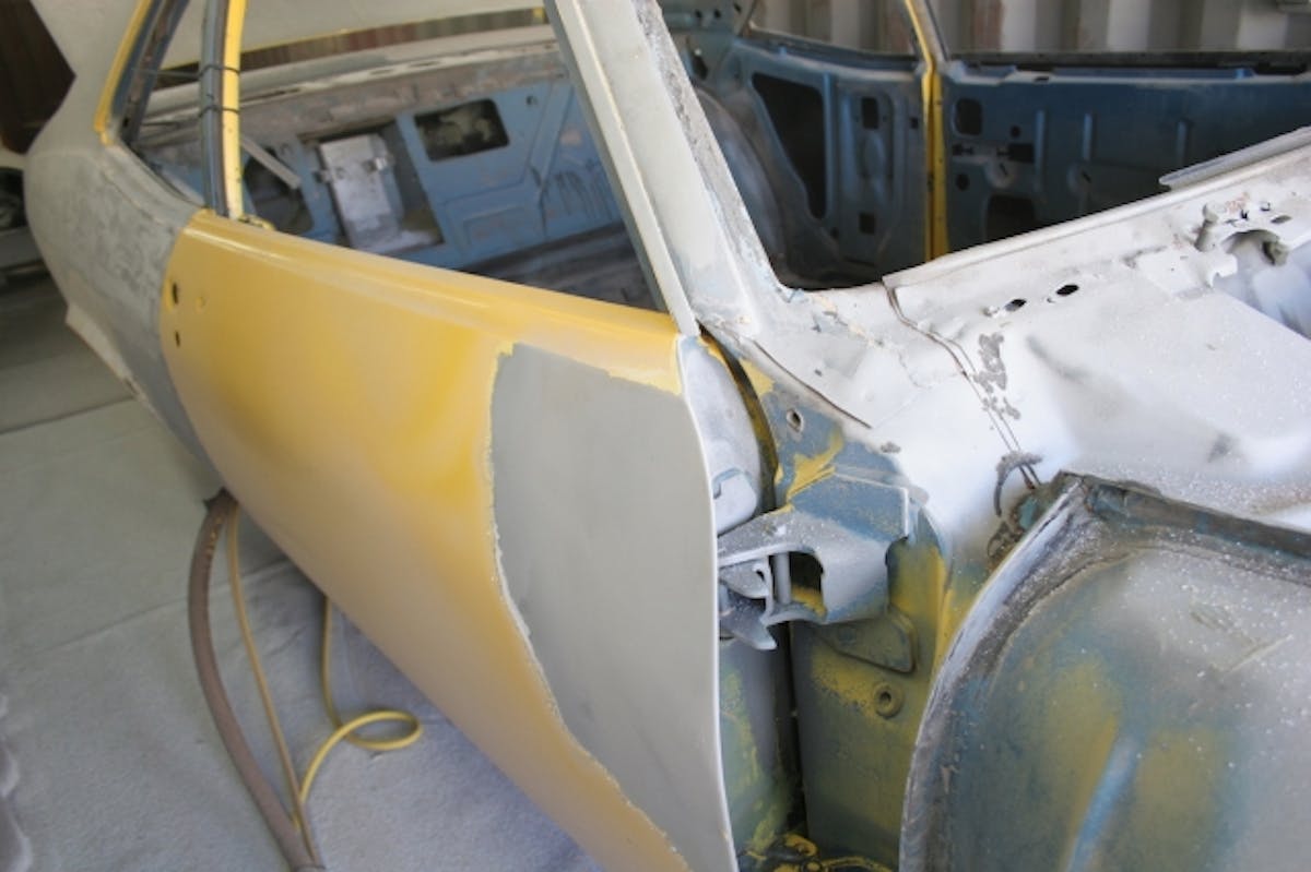 We pulled all the parts off of our project car and sent it to Back's Autobody for sandblasting. After the paint was removed, we found a few more things that needed repaired.