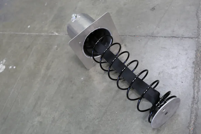 For BlownZ, we chose the mechanical launcher option. The spring is housed within the can at the top of the photo and is retracted with a wrench, whereupon a pin is inserted into the housing for retention while the parachute is packed.