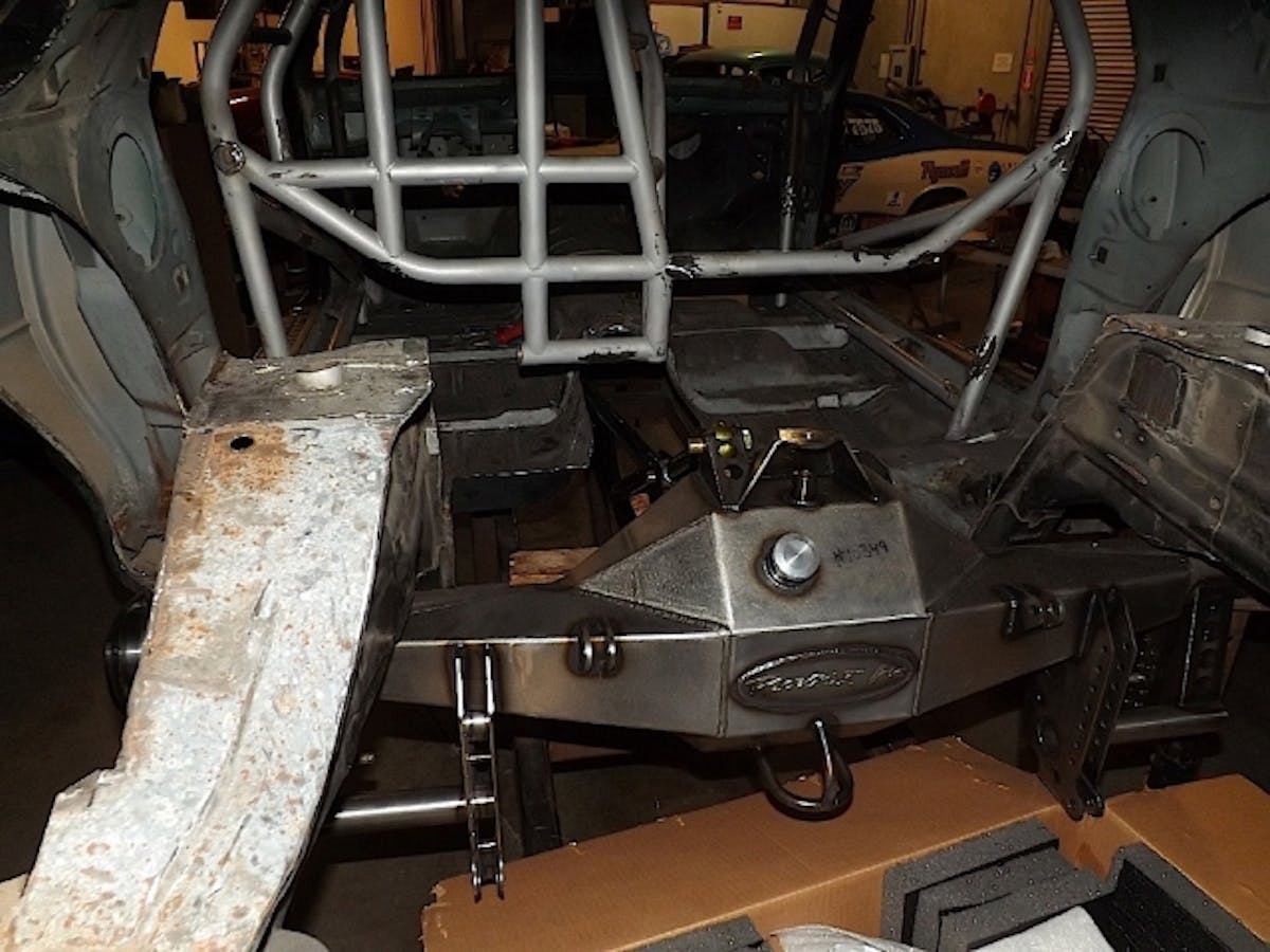 At this point, we’ve got part of the 25.5 roll cage cut out, but we’ve still got the rear frame rails in the car to check fitment on the Racecraft rear end housing and take all of the measurements that we need. The frame rails will come out soon just to be cleaned and dipped, but they will be put back in soon.