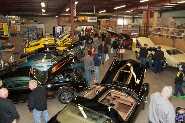 A glimpse into the warehouse full of parts and collector cars. 
