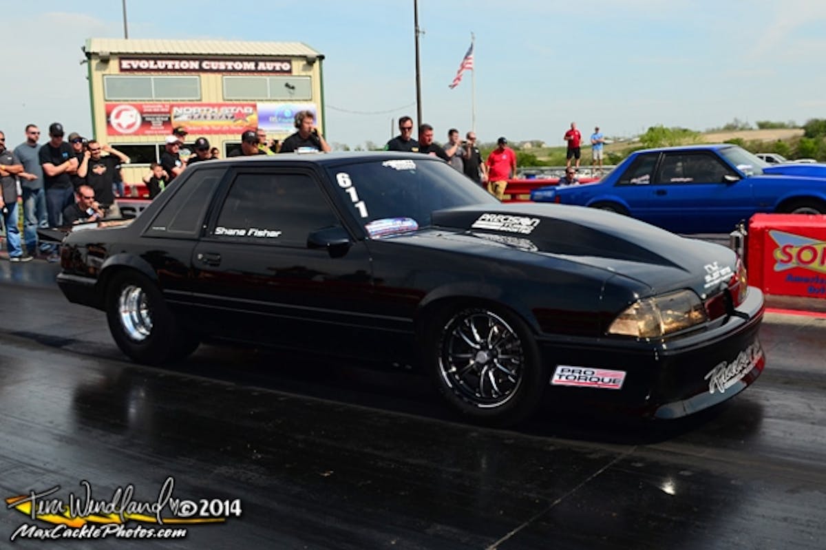 EX275 runner-up and current X275 national record holder Shane Fisher and his sinister Mustang.
