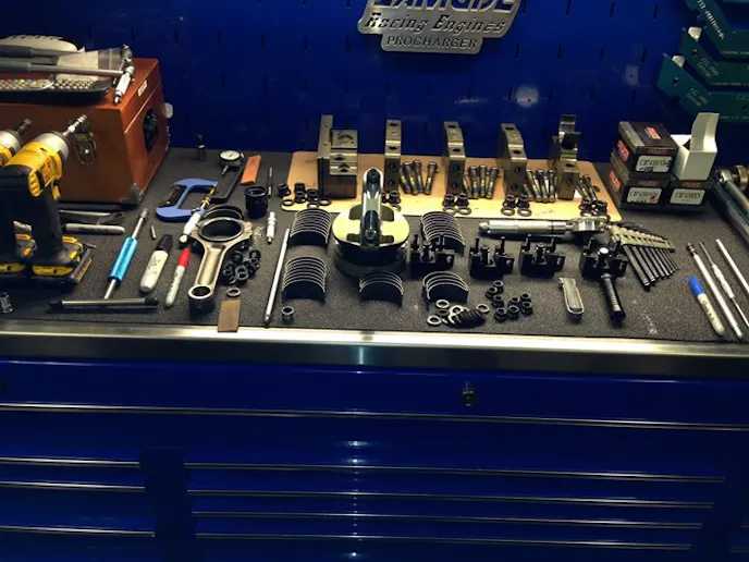 The internals laid out on the bench for assembly.