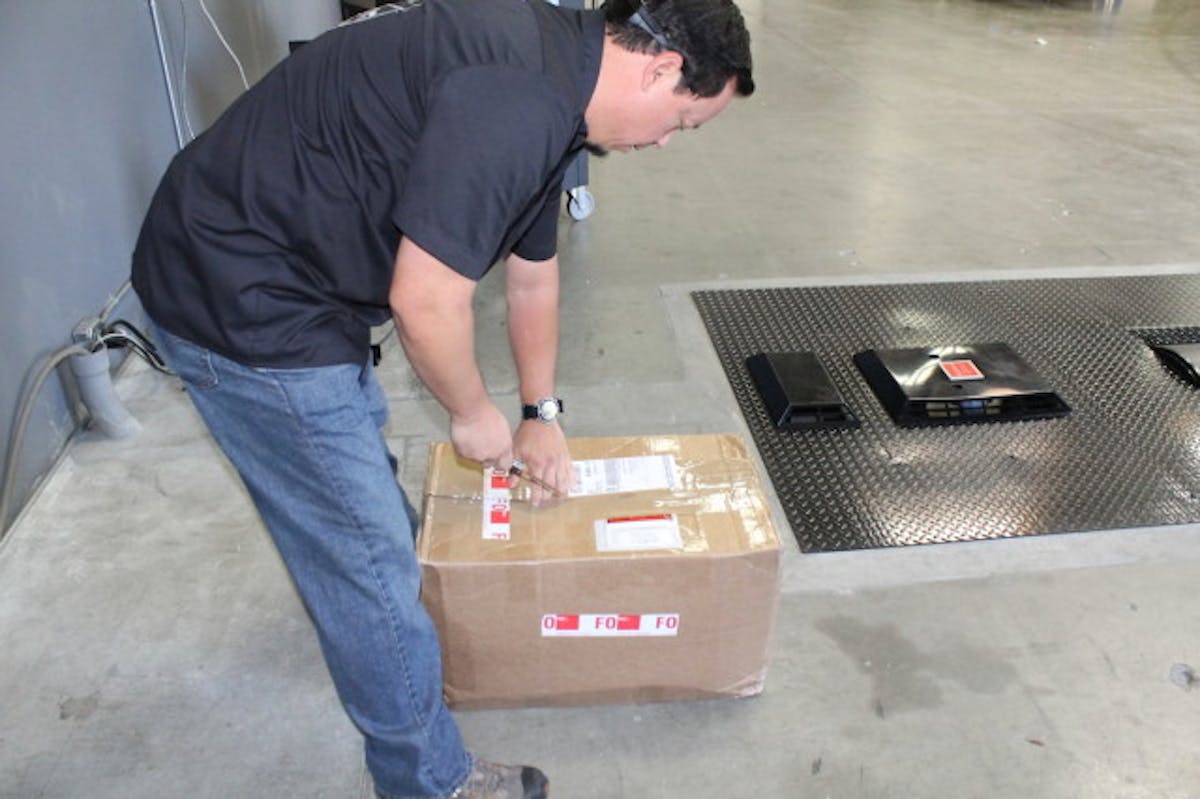 DynoJet's Sales and Marketing Manager, Will Fong, came out to help us with the upgrade. He even opened the box and inventoried the parts.