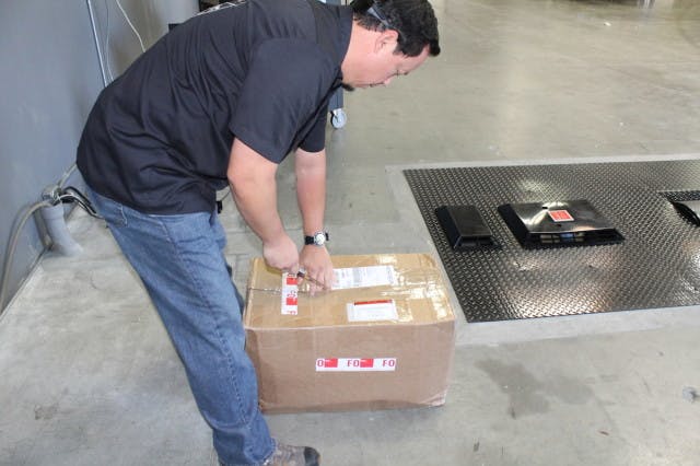 DynoJet's Sales and Marketing Manager, Will Fong, came out to help us with the upgrade. He even opened the box and inventoried the parts.