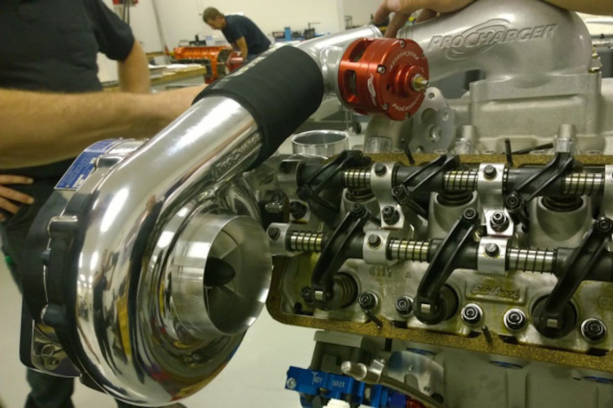 Edelbrock's GEN II cylinder heads were used along with the custom-fabbed Edelbrock/Arrington dual-plane intake manifold. The F-2 ProCharger provides the extra motivation.