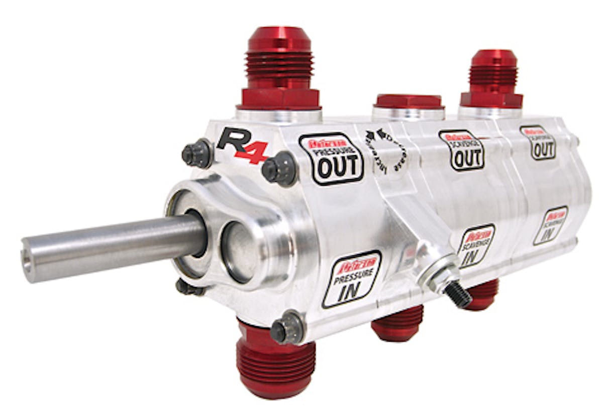 Peterson Fluid Systems wanted to make packaging a vacuum pump into an external wet sump oiling system easier. Enter the Wide-VAC. The Wide-VAC is a 3-stage lobe rotor pump with a dual purpose. A single 1.4” front stage pumps oil from the pan to the engine for lubrication. Dual 2.4” rear stages pull air out of the engine to create a vacuum on the crankcase.